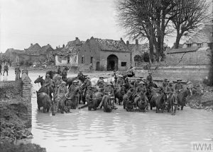 235th Brigade (47th Divisional Artillery) water their horses near Flesquieres, 24 November 1917. The cavalrys scope for movement was circumscribed by the availability of water for the horses, which also impacted the 8th Hussars.© IWM (Q 6316)